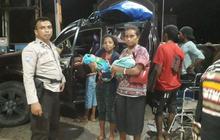Heroik! Aipda Johanis Selamatkan Warga Pedalaman Alami Pendarahan, Tak Gentar Jajal Medan Terjal & Arus Sungai Deras
