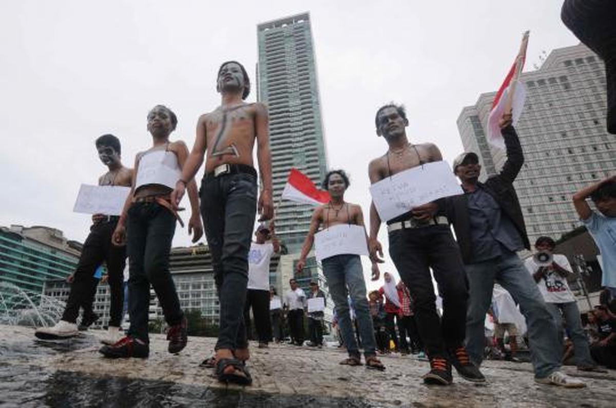 Demo anti-poligami di Bundaran HI