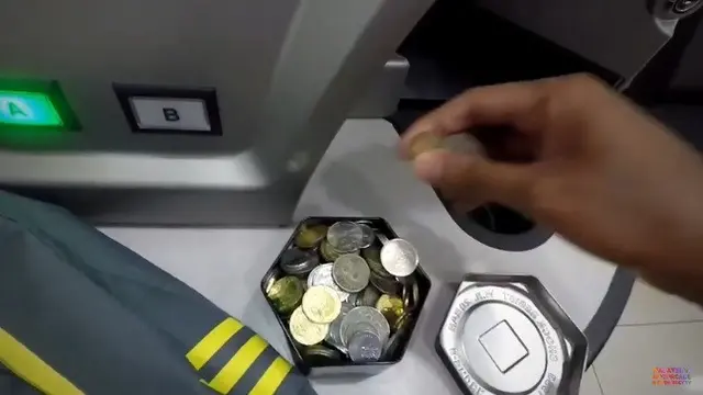 mesin setor tunai uang koin di Malaysia