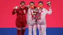 Leani Ratri Oktila kembali naik podium dengan mendapatkan medali perak pada laga final tunggal putri SL4 cabang olahraga bulutangkis Paralimpiade Tokyo 2020 di Yoyogi National Stadium, Minggu (5/9/2021) pagi WIB. (Foto: AFP/OIS/IOC/Joe Toth)
