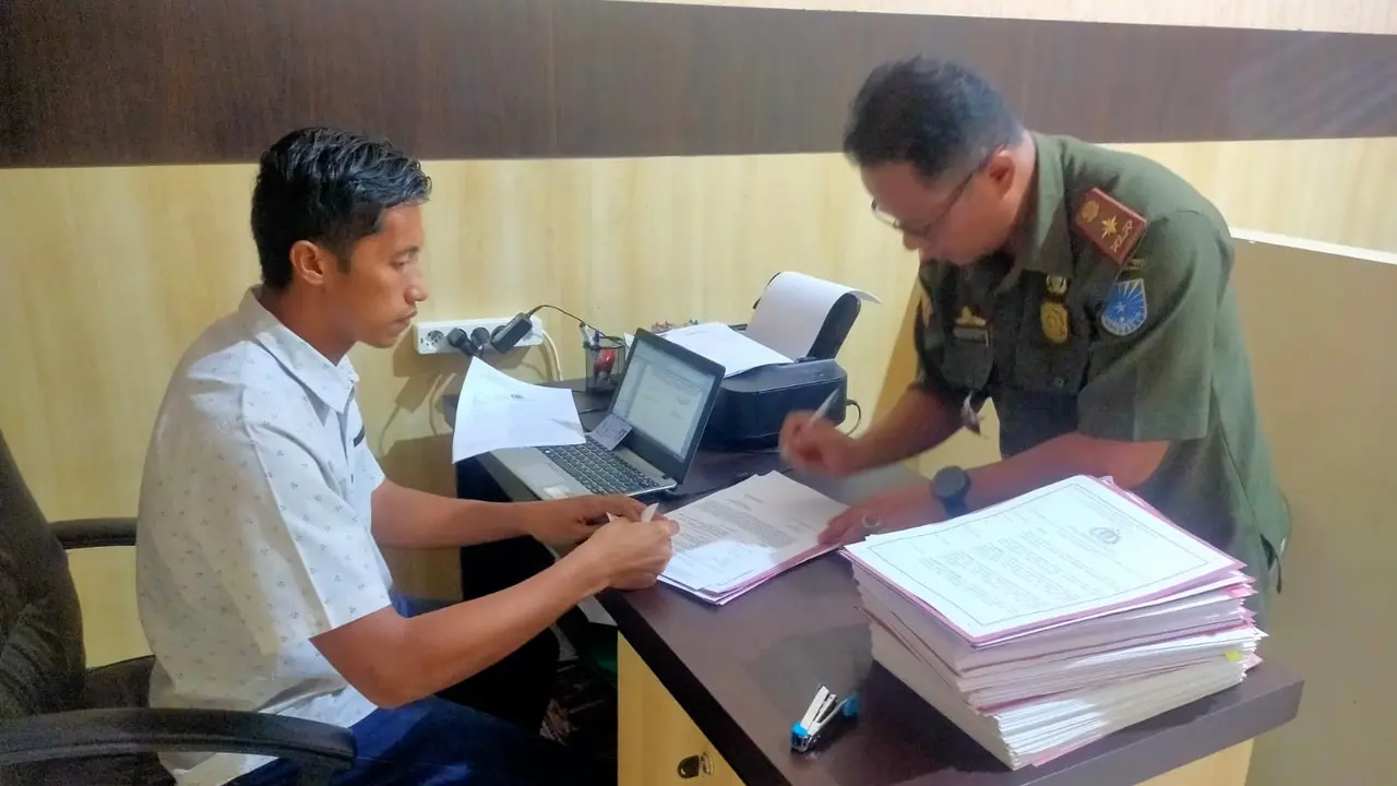 Kasatpol PP Probolinggo Kota Aman Suryaman membuat Laporan ke Polisi Terkait pencatutan namanya dalam kasus penipuan (Istimewa)