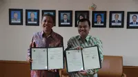 Kepala Badan Geologi Kementerian Energi dan Sumber Daya Mineral (ESDM) Rudy Suhendar dan Ketua Badan Informasi Geospasial (BIG) Hasanudin Z. Abidin.