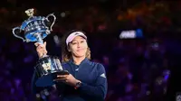 Petenis asal Jepang, Naomi Osaka, berhasil menjuarai turnamen Australia Terbuka 2019 setelah mengalahkan Petra Kvitova dalam laga final di Rod Laver Arena, Melbourne, Sabtu (26/1/2019). (AFP/Jewel Samad)