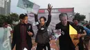 Sejumlah mahasiswa menggelar aksi teaterikal Skandal Freeport di bundaran Patung Kuda, Jakarta, Minggu (27/12/2015). Aksi tersebut sebagai bentuk sindiran kepada pemerintah terkait kasus Freeport. (Liputan6.com/Angga Yuniar)
