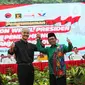 Bakal calon wakil presiden (cawapres) pendamping Ganjar Pranowo dan Menko Polhukam) Mahfud MD acara pengumuman bakal calon wakil presiden pada Pilpres 2024 di Kantor DPP PDIP, Jakarta, Rabu (18/10/2023).   (Liputan6.com/Faizal Fanani)