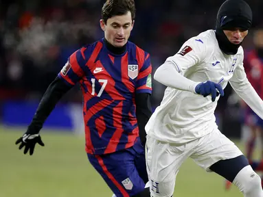 Laga Amerika Serikat melawan Honduras di Kualifikasi Piala Dunia 2022 pada Rabu (02/01/2022) waktu setempat, tercatat sebagai pertandingan sepak bola terdingin di dunia dalam 20 tahun terakhir. (AP/Andy Clayton-King)