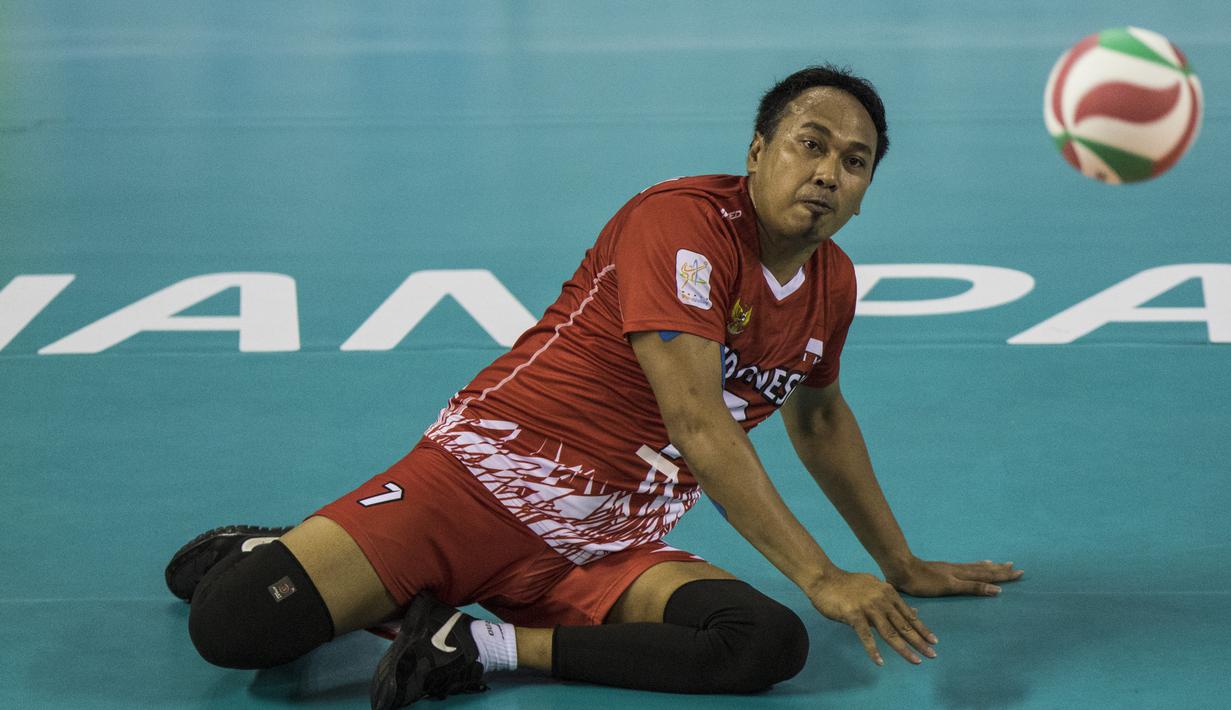 Pevoli Indonesia, Tatag Sugiyono, tampak kecewa dikalahkan Myanmar pada laga Asian Para Games di Tenis Indoor Senayan, Jakarta, Minggu (7/10/2018). Indonesia kalah 0-3 dari Myanmar. (Bola.com/Vitalis Yogi Trisna)
