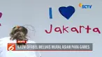 Gubernur DKI Jakarta Anies Baswedan serta Wakil Ketua Inapgoc Sylviana Murni yang membuka kegiatan ini juga ikut menggoreskan kuas.