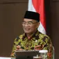 Dalam video conference, Selasa (2/6/2020), Menko PMK Muhadjir Effendy mengatakan, potokol kesehatan yang matang harus jadi fokus utama penyelenggaraan kegiatan keagamaan di rumah ibadah. (Dok Kemenko PMK)