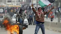 Demonstrasi warga Palestina di Kota Ramallah, Tepi Barat. (Reuters/Mohamad Torokman)