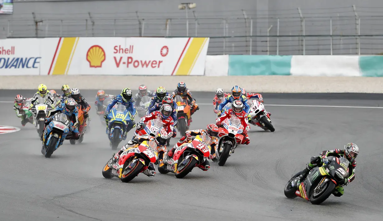 Suasana balapan MotoGP Malaysia di Sirkuit Sepang, Minggu (29/10/2017). Dovizioso finis pertama dengan catatan waktu 44 menit 51,497 detik. (AP/Vincent Thian)