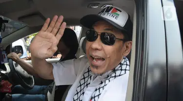 Mantan Sekretaris Umum Front Pembela Islam (FPI) Munarman keluar dari Lembaga Pemasyarakatan (Lapas) Salemba, Jakarta Pusat, Senin (30/10/2023). (merdeka.com/Imam Buhori)