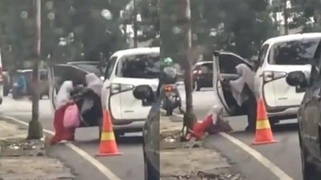 viral video ibu dorong anak keluar mobil