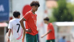 Pemain Timnas Portugal U-15, Cristiano Dos Santos, putra Cristiano Ronaldo, bereaksi selama pertandingan antara Portugal dan Jepang sebagai bagian dari turnamen Vlatko-Markovic U-15 di Sveti Martin na Muri pada 13 Mei 2025. (DAMIR SENCAR/AFP)