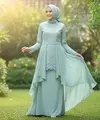 Model Gamis Teal Pastel untuk Acara Keluarga. Foto: Gemini