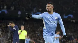 Penyerang Manchester City Gabriel Jesus merayakan gol kedua timnya yang dicetak ke gawang Paris Saint Germain (PSG) pada match day ke-5 fase grup Liga Champions di Etihad Stadium, Kamis (25/11/2021) dinihari WIB. Manchester City menang comeback melawan PSG 2-1. (AP Photo/Scott Heppell)