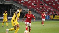 Gelandang Timnas Indonesia, Irfan Jaya, saat ini mengoleksi tiga gol atau tertinggal satu gol dari Teerasil Dangda. (dok. AFF)