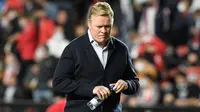 Ronald Koeman meninggalkan Barcelona sebagai manajer dengan rekor kemenangan terburuk dalam dua dekade terakhir. Selama masa jabatannya, ia hanya mampu menciptakan presentase kemenangan sebesar 58%. Koeman gagal melakukan pekerjaan di tengah krisis keuangan Barcelona. (AFP/Oscar Del Pozo)