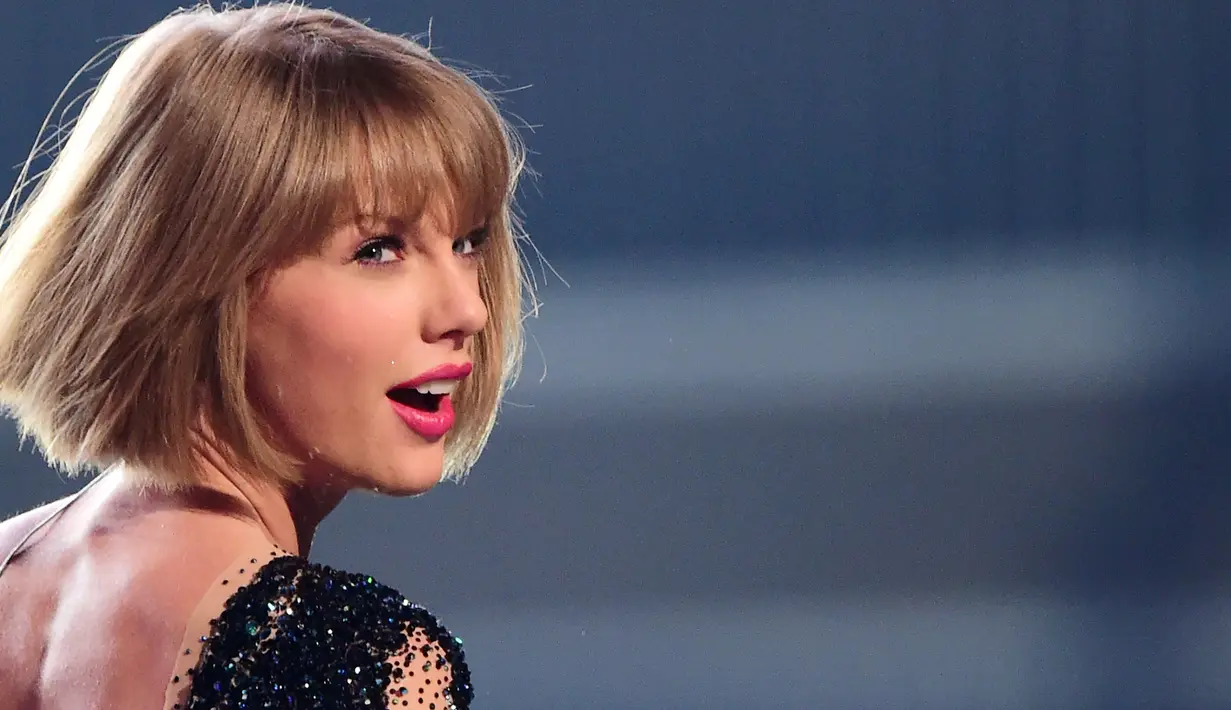 "Taylor dewasa dengan cepat beberapa tahun terakhir dan menyadari bahwa ia ingin hubungan yang lebih stabil,"   ujar sumber. (ROBYN BECK  AFP)