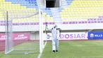 Petugas menyemprot jaring gawang dengan cairan disinfektan sebelum pertandingan antara Persikabo 1973 melawan Arema FC pada laga Piala Menpora di Stadion Manahan, Solo, Minggu (21/3/2021). (Bola.com/M Iqbal Ichsan)