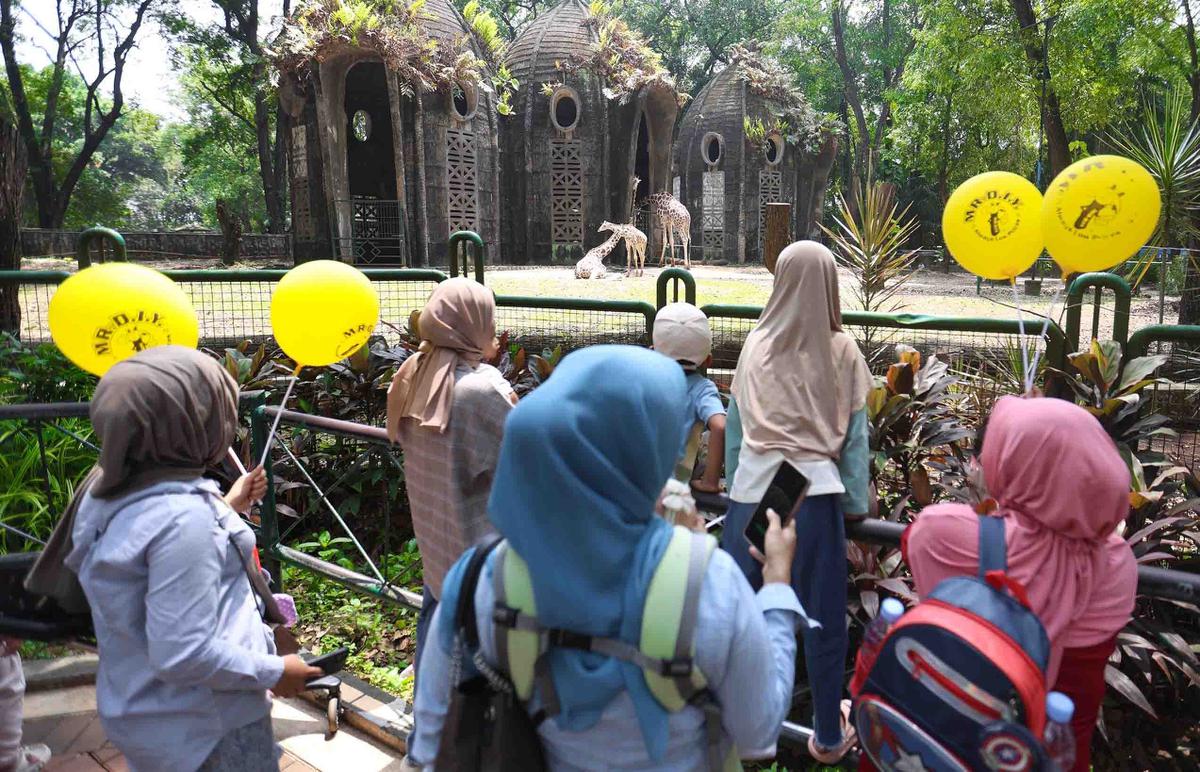 FOTO: Peringatan Maulid Nabi, Ragunan Diserbu Pengunjung