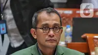 Wakil Menteri Hukum dan HAM RI, Edward Omar Sharif Hiariej mengikuti rapat kerja dengan Komisi III DPR RI di Kompleks Parlemen, Senayan, Jakarta, Rabu (9/11/2022). Rapat tersebut membahas penyampaian penyempurnaan Rancangan Kitab Undang-undang Hukum Pidana (RKUHP) hasil sosialisasi Pemerintah. (Liputan6.com/Angga Yuniar)