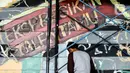 Suku Dinas Kebudayaan (Sudinbud) Jakarta Timur menggelar pelatihan seni mural. (Liputan6.com/Herman Zakharia)