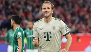 Penyerang Bayern Munich asal Inggris #09, Harry Kane, merayakan gol penalti dalam pertandingan divisi satu Bundesliga Jerman antara Bayern Munich dan Werder Bremen di Munich, Sabtu (27-9-2025) dini hari WIB. (Alexandra BEIER/AFP)