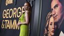 Jessica Chastain berpose saat tiba menghadiri pemutaran perdana film "George & Tammy," di Goya Studios di Los Angeles (21/11/2022). Jessica mkenata rambut panjangnya menjadi ekor kuda rendah, membiarkan rambutnya mengalir di belakangnya. (Photo by Jordan Strauss/Invision/AP)