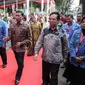 Kepala BNN, Komjen Pol Budi Waseso (kiri) bersama Menko Polhukam Wiranto saat menghadiri puncak peringatan Hari Anti-Narkoba Internasional (HANI) di Plaza Tugu Api Pancasila, Taman Mini Indonesia Indah, Jakarta, Kamis (13/7). (Liputan6.com/Faizal Fanani)