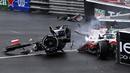Pembalap Tim Haas, Mick Schumacher mengalami kecelakaan saat Formula 1 GP Monako yang berlangsung di Circuit de Monaco, Minggu, 29 Mei 2022. (AP/Pool/Christian Bruna)