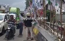 Pasutri Alami Kecelakaan di Flyover Kuningan Gara-gara Bendera Parpol Jatuh