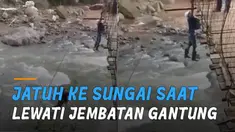 Terlihat seorang perempuan jatuh di sungai dan seorang pria bergelantungan di jembatan.