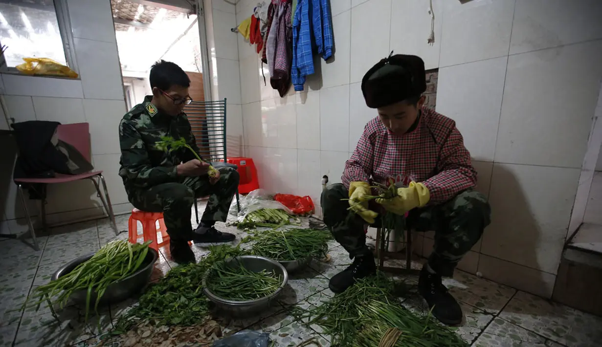 Kemandirian menjadi menu utama pelatihan para siswa selama berada di Pusat Pendidikan Qide, Beijing, 19/2/2014. (REUTERS/Kim Kyung-Hoon)