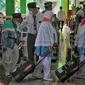 Jemaah calon haji kloter I asal Kabupaten Pati telah tiba di Asrama Haji Donohudan, Boyolali, Jumat (3/6).(Liputan6.com/Fajar Abrori)