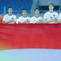 Pemain Timnas Indonesia U-22 menyanyikan Indonesia Raya sebelum melawan Filipina U-22 pada laga Grup C SEA Games 2025 di 700th Anniversary Stadium, Senin (8/12/2025). (Bola.com/Bagaskara Lazuardi)