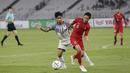 Gelandang Timnas Indonesia, Evan Dimas, menggiring bola saat melawan Filipina pada laga Piala AFF 2018 di SUGBK, Jakarta, Minggu (25/11). Kedua negara bermain imbang 0-0. (Bola.com/M. Iqbal Ichsan)