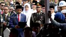 Presiden Joko Widodo atau Jokowi menyampaikan sambutan saat prosesi pemakaman istri presiden ke-6 RI Susilo Bambang Yudhoyono (SBY), Ani Yudhoyono di TMP Kalibata, Jakarta, Minggu (2/6/2019). Ani Yudhoyono dimakamkan secara militer. (Liputan6.com/JohanTallo)