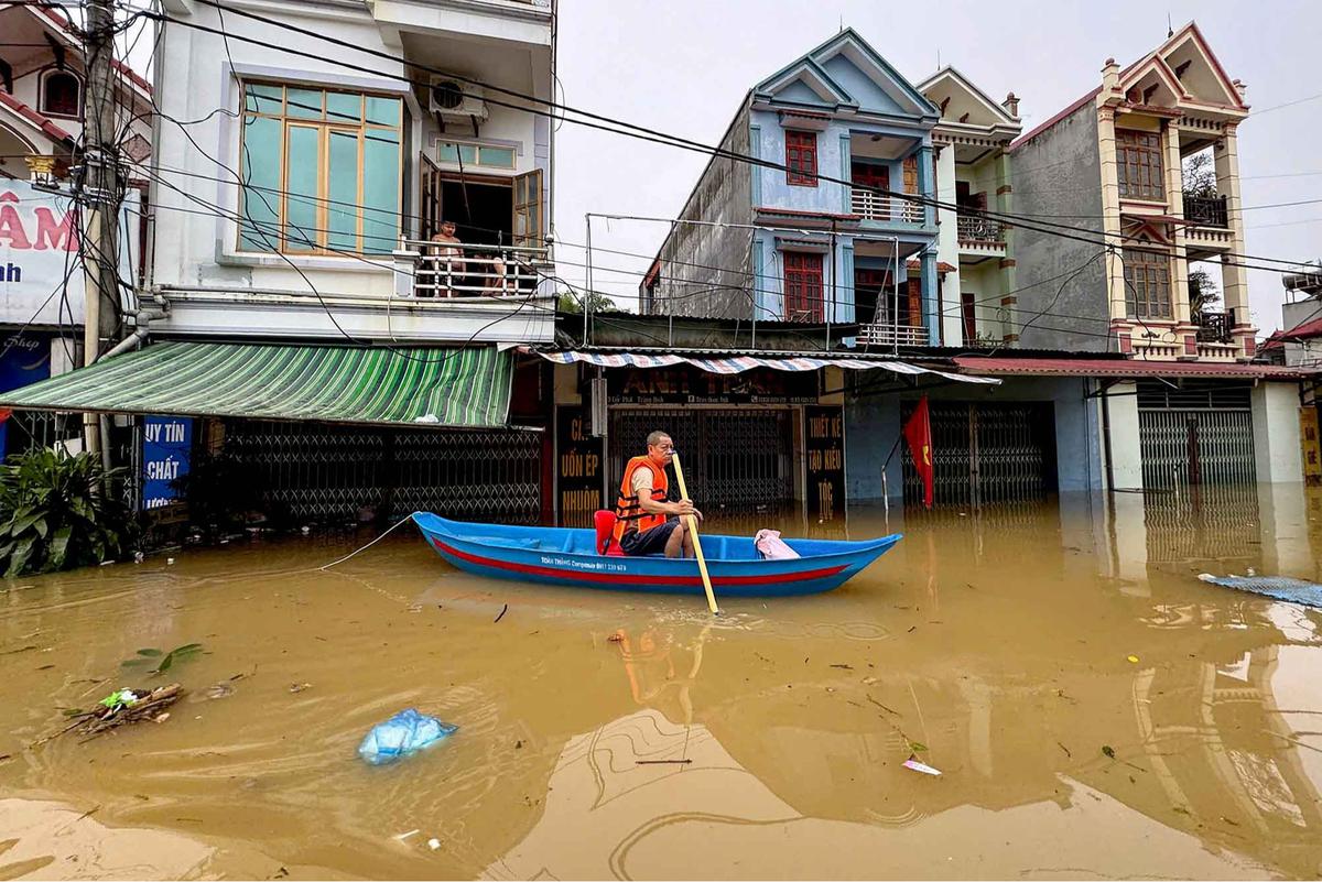 FOTO: Topan Matmo Luluhlantakkan Vietnam Utara, Banjir Terburuk dalam 60 Tahun