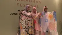 Kolaborasi apik Ria Miranda dan band hijab asal Malaysia, Aidijuma untuk dikenakan di hari Idul Fitri nanti. 