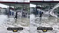 Viral Video Orang Jala Ikan di Jalan Raya saat Banjir, Jadi Sorotan (sumber: TikTok/everdedward38)