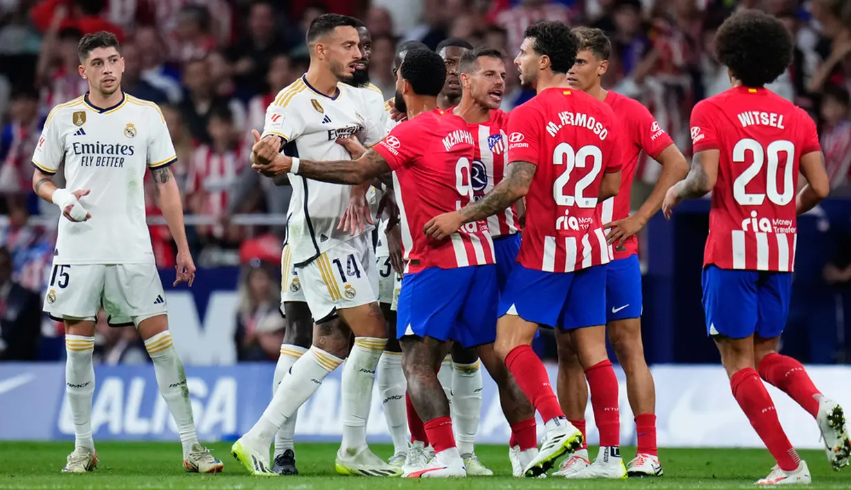 Beberapa saat kemudian, Atletico Madrid mampu menggandakan keunguulan menjadi 2-0. Kali ini giliran Antoine Griezmann yang mencatatkan namanya di papan skor. (AP Photo/Manu Fernandez)
