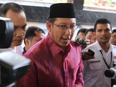 Menteri Agama Lukman Hakim Saifuddin mendatangi gedung KPK, Jakarta, Kamis (25/6/2015). Kedatangan Lukman untuk membahas penggunaan dan penyerapan APBN di Kemenag sebagai upaya untuk mencegah korupsi di Kemenag. (Liputan6.com/Helmi Afandi)