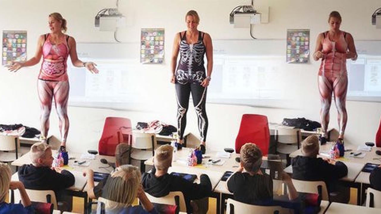 Ibu guru ini buka baju di depan kelas untuk jelaskan anatomi tubuh