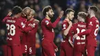 Penyerang Liverpool, Mohamed Salah (tengah) berselebrasi dengan rekan satu timnya setelah mencetak gol ke gawang Rangers selama pertandingan lanjutan Grup A Liga Champions di stadion Ibrox di Glasgow, Skotlandia, Kamis, 13 Oktober 2022. Salah mencetak tiga gol dan mengantar Liverpool menang telak atas Rangers 7-1. (AP Photo/Scott Heppell)