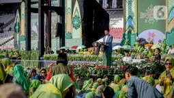 "Saya ingin mengucapkan selamat Harlah ke-78 kepada keluarga besar muslimat NU semoga muslimat NU selalu guyub rukun bersatu untuk kepentingan umat bangsa dan negara," kata Jokowi. (Liputan6.com/Faizal Fanani)