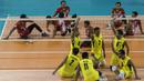 Pevoli duduk Myanmar merayakan kemenangan atas Indonesia pada laga Asian Para Games di Tenis Indoor Senayan, Jakarta, Minggu (7/10/2018). Indonesia kalah 0-3 dari Myanmar. (Bola.com/Vitalis Yogi Trisna)