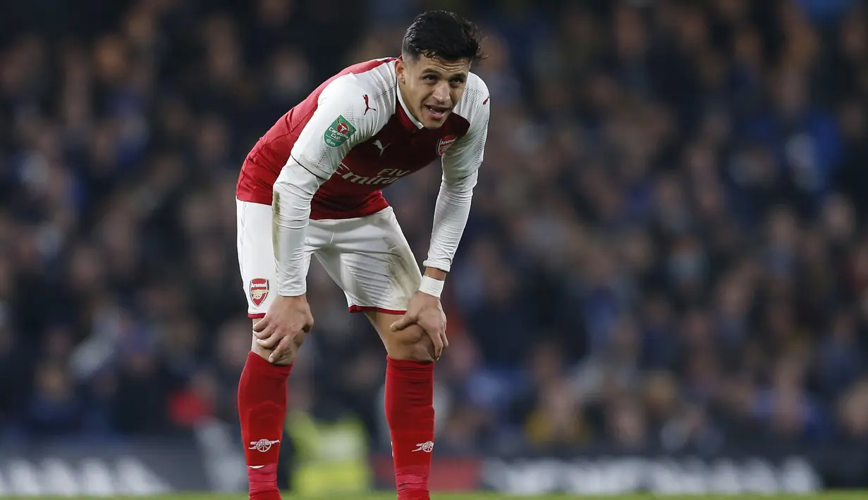 Setelah bermain untuk Barcelona, Alexis Sanchez merapat ke Arsenal namun ia diduga belum menyelesaikan kewajiban membayar pajak untuk pmerintah Spanyol. (AFP/Ian Kington)