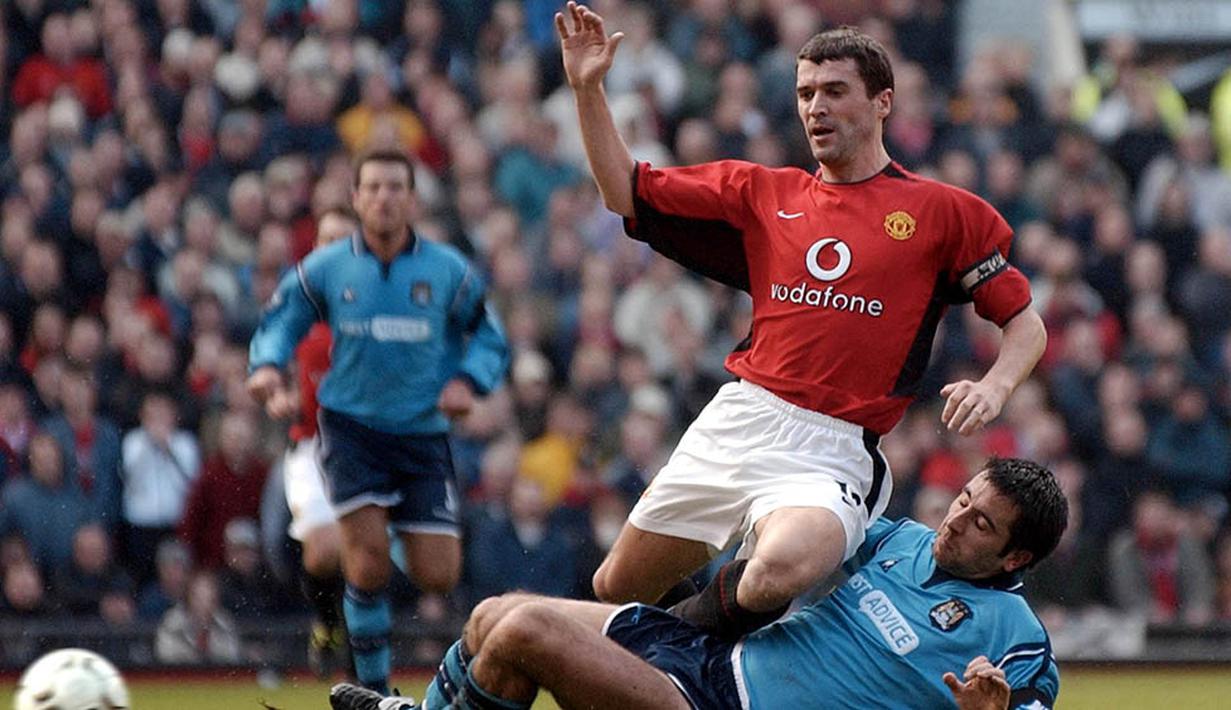 Roy Keane dibeli MU dari Nottingham Forest dengan harga 3,75 juta poundsterling. Dirinya merupakan salah satu kapten terbaik Red Devil di era Sir Alex Ferguson. (AFP/Paul Barker)