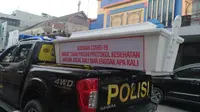 Polisi melakukan sosialisasi dengan cara menghadirkan peti mati di Terminal Sambu, Kecamatan Medan Timur, Kamis, 24 September 2020.
